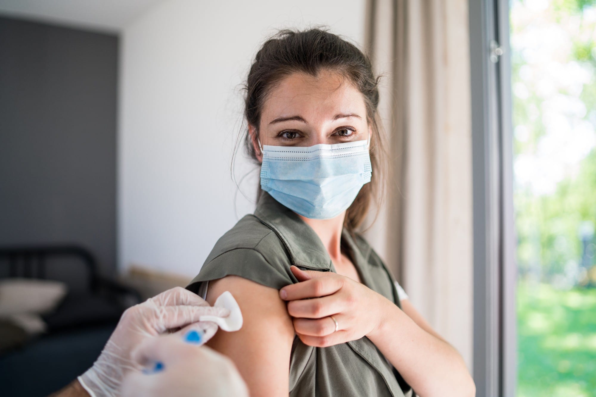 woman getting vaccine